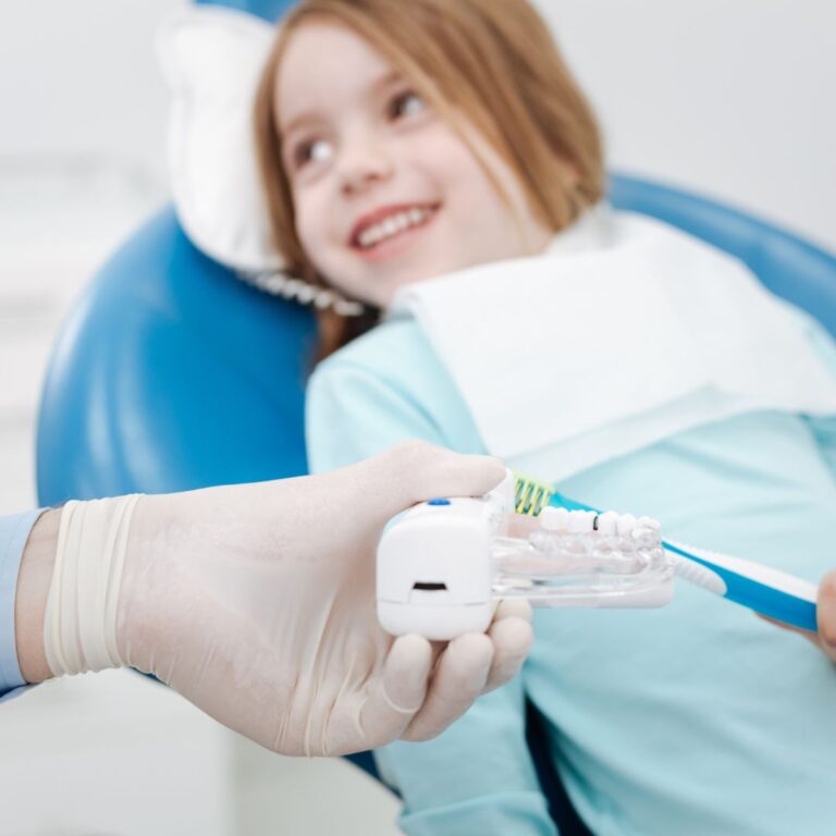 an image of a child at the dentist.